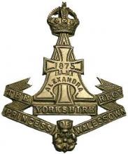 Image of the Green Howards Regiment cap badge. Image by Jakednb and published by Wikipedia, is reproduced under CC BY-SA 3.0 licence.