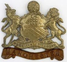 Image of the Manchester Regiment cap badge (Crown copyright)