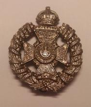 Image of the Rifle Brigade (The Prince Consort's Own) cap badge. Image by Dormskirk (Own work) [GFDL (http://www.gnu.org/copyleft/fdl.html) or CC-BY-SA-3.0 (http://creativecommons.org/licenses/by-sa/3.0/)], via Wikimedia Commons.