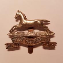Image of the West Yorkshire Regiment (Prince of Wales's Own) cap badge